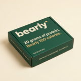 The Bearly 28-day box — malachite mailer with 20 grams of protein, Bearly 100 calories on the lid