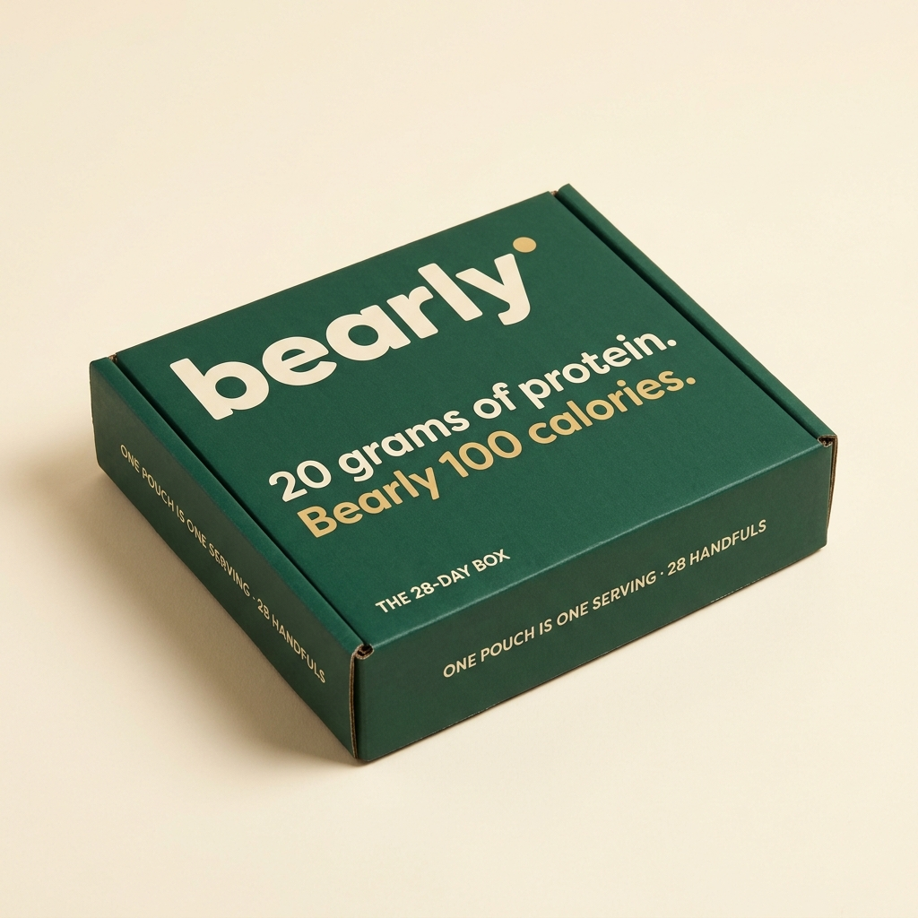 The Bearly 28-day box — malachite mailer with 20 grams of protein, Bearly 100 calories on the lid