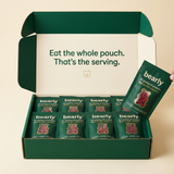 The Bearly 28-day box opened — pouches packed tight, Eat the whole pouch printed inside the lid